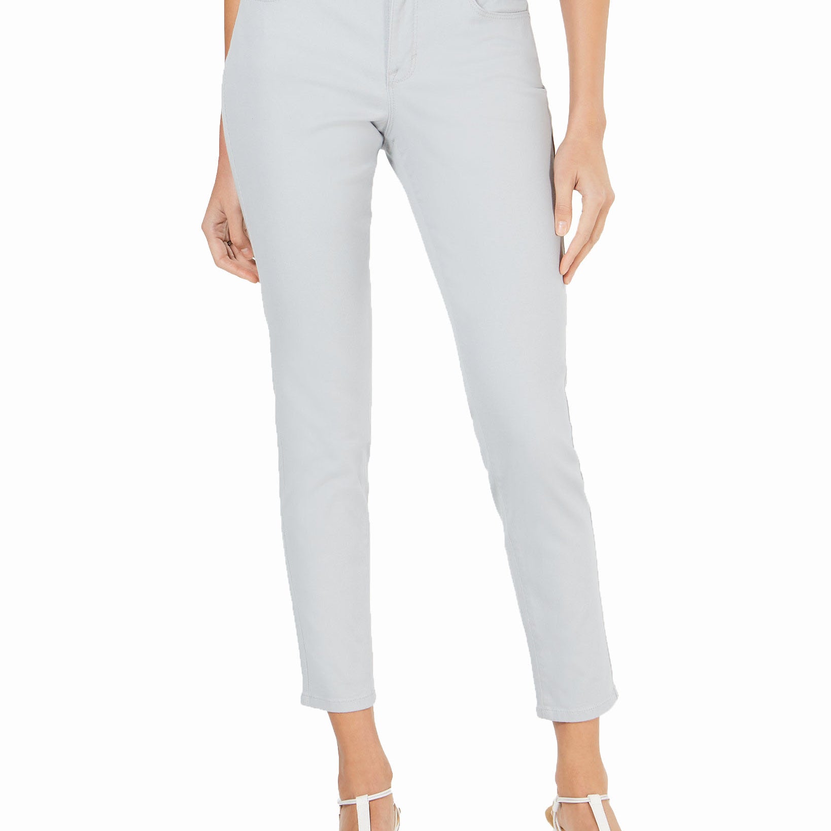 Light gray jeans worn by a person on a white background