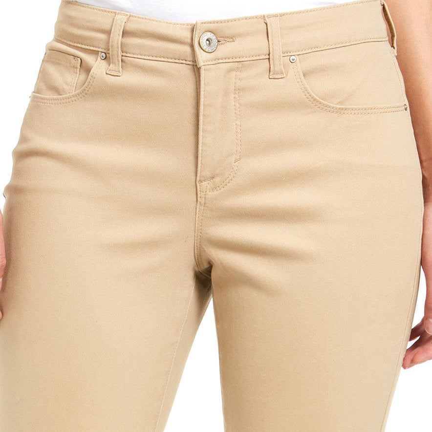 Beige pants worn by a person on a white background