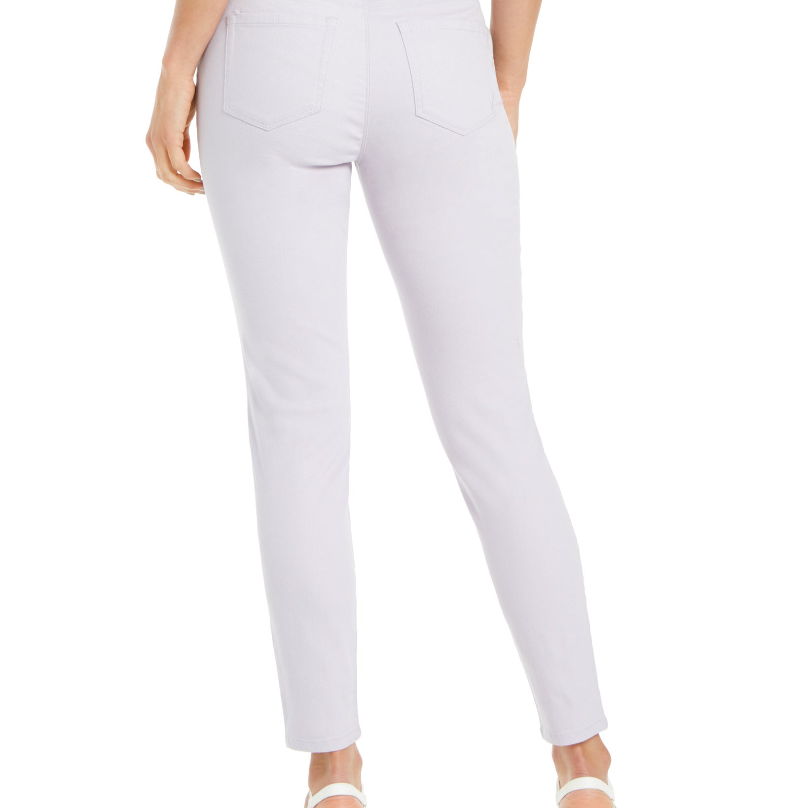 Light purple pants worn by a person on a white background