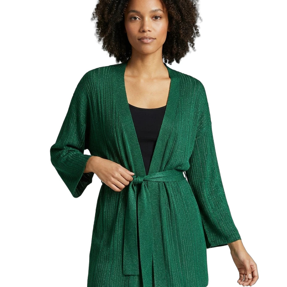 Woman wearing a green cardigan on a white background