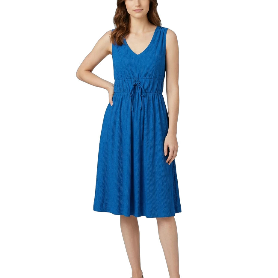 Woman wearing a blue dress on a white background