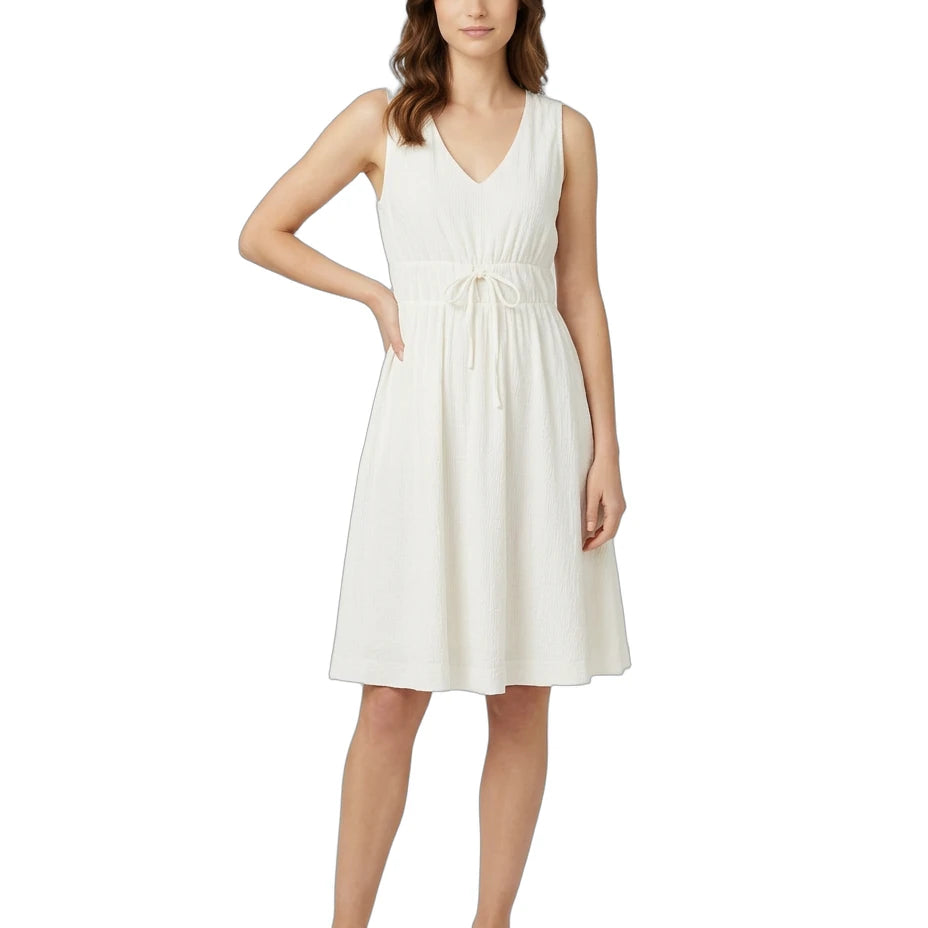 Woman wearing a white dress on a white background