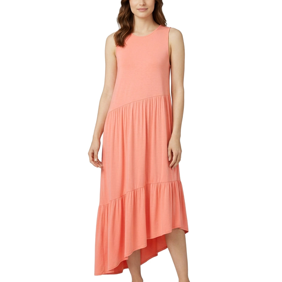 Woman wearing a coral dress on a white background