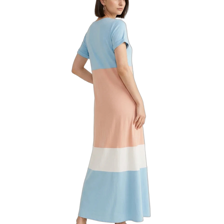 A woman modeling a color-block midi dress with short sleeves, featuring light blue, peach, white, and light blue horizontal color-blocked panels, shown from a rear three-quarter angle on a white background.