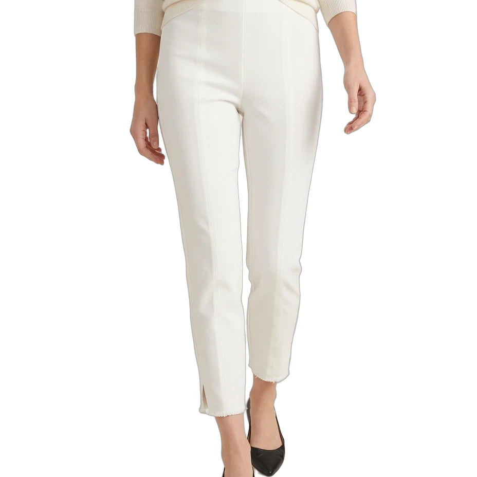 A model wearing a pair of off-white cropped trousers with a slight sheen, styled with a cream sweater and black pointed-toe heels against a plain white background.