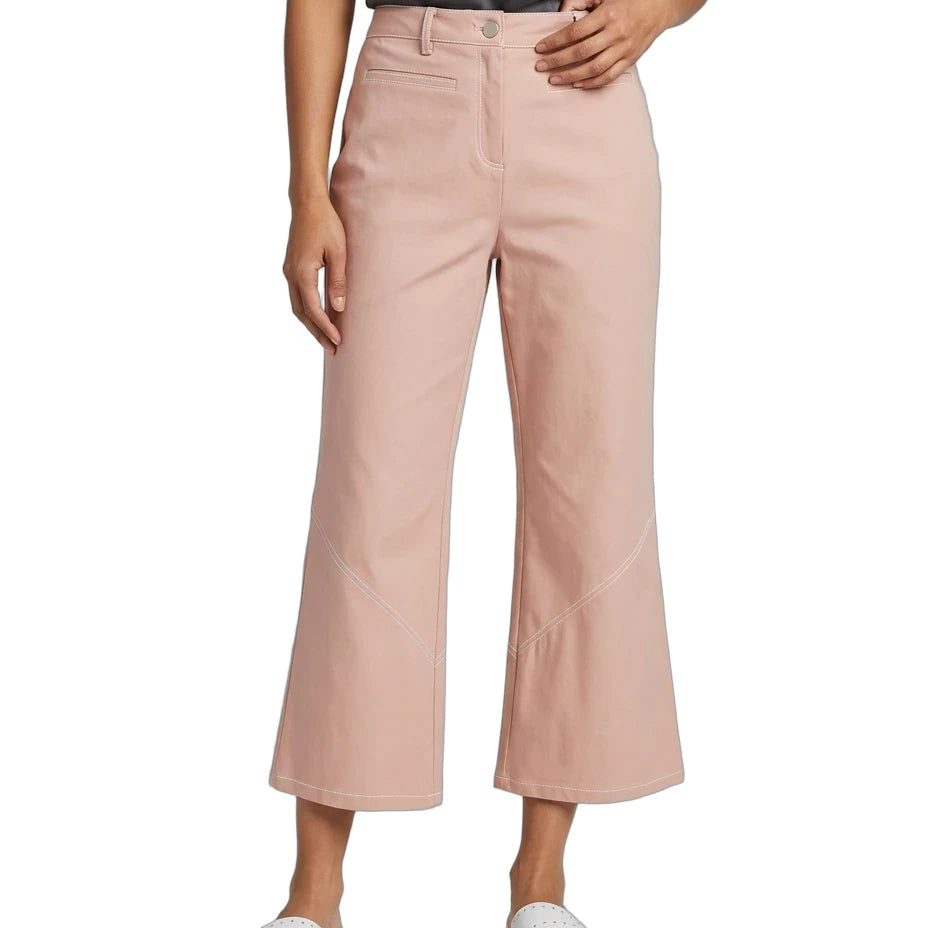 A model wearing dusty pink cropped wide-leg pants, paired with a dark gray top and white slide sandals, shown against a plain white background.