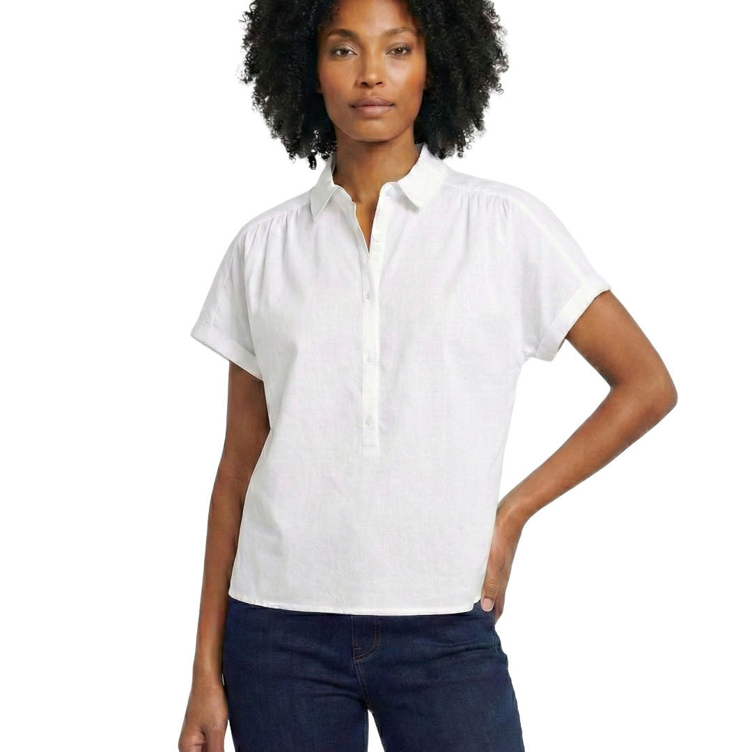Woman wearing a white short-sleeve blouse on a white background