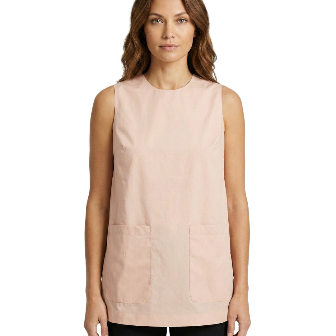 Woman wearing a light pink sleeveless top on a white background