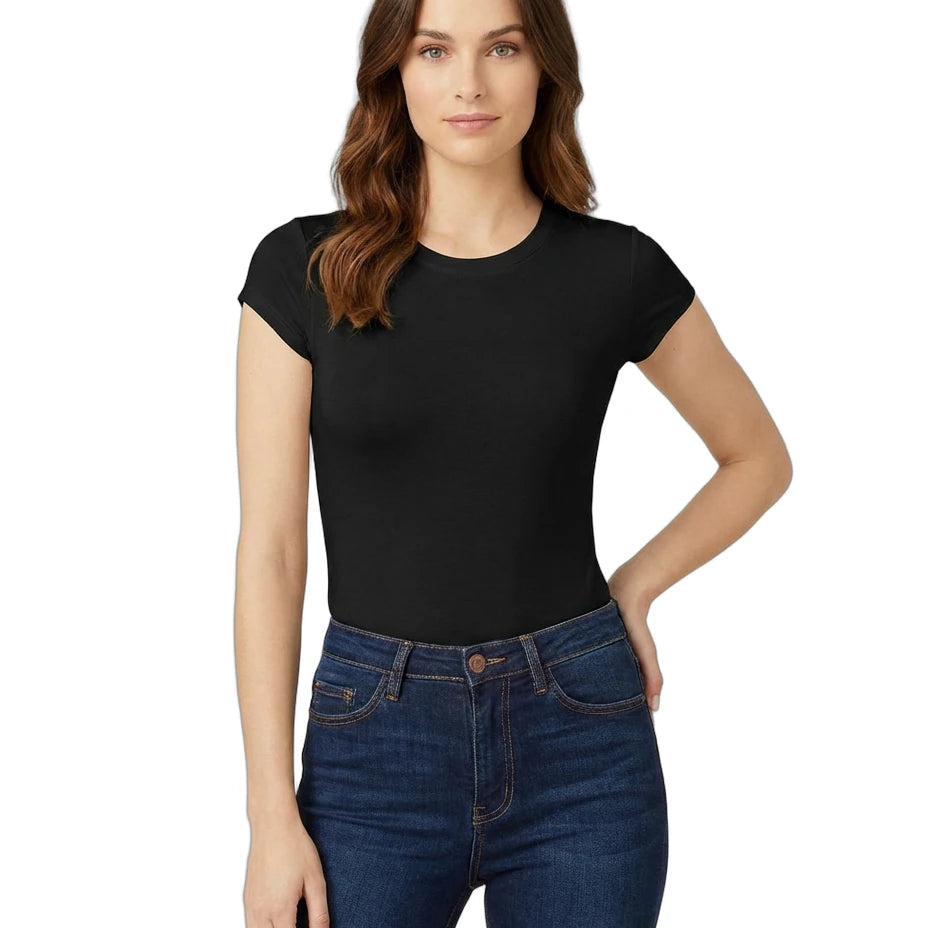 Woman wearing a black t-shirt and blue jeans on a white background
