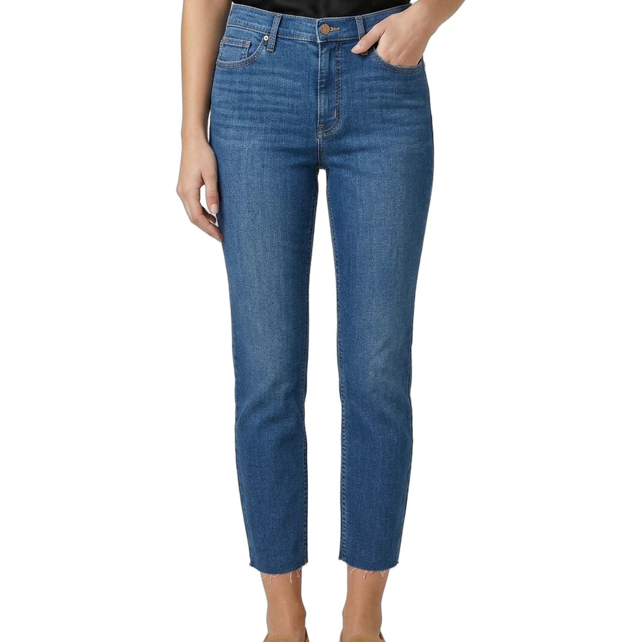 Person wearing blue jeans on a white background
