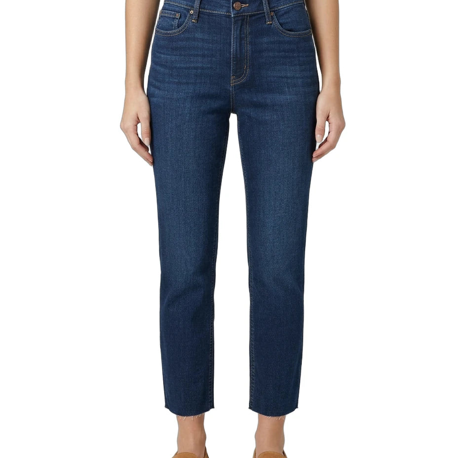 Person wearing blue jeans on a white background