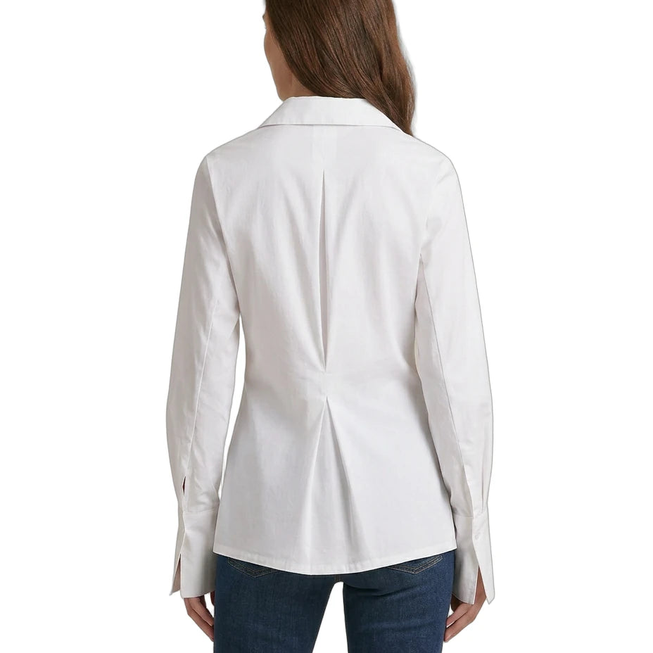 Woman wearing a Calvin Klein white blazer on a white background