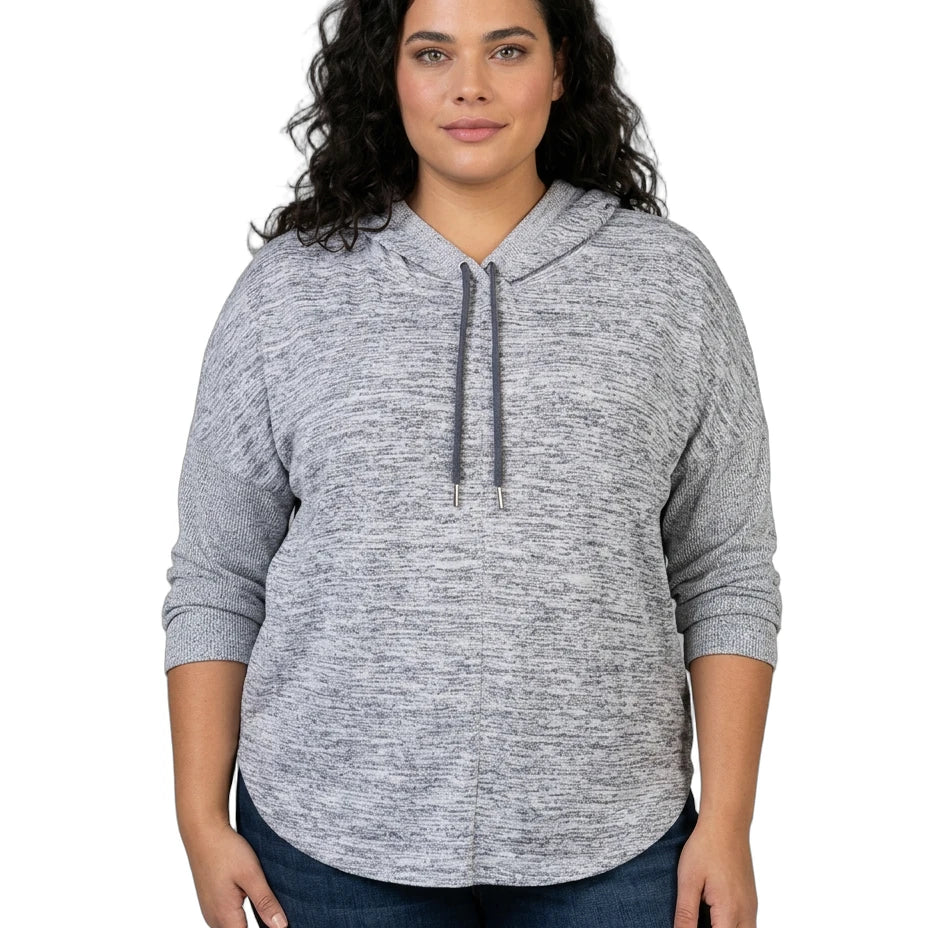 Woman wearing a gray hoodie on a white background