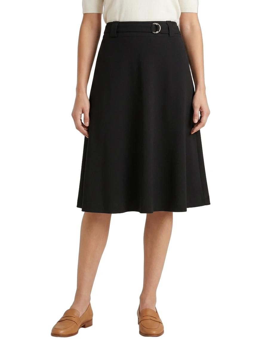 Black Calvin Klein skirt worn by a person on a white background