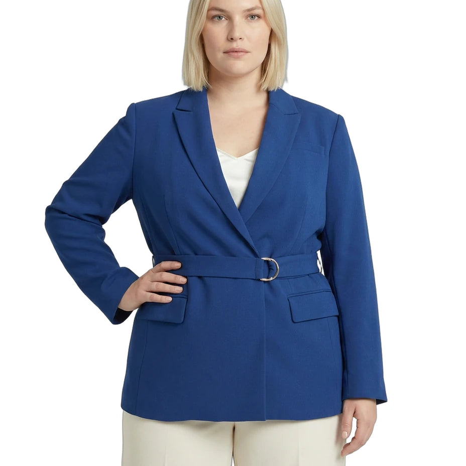 Woman wearing a blue Calvin Klein blazer with a white background