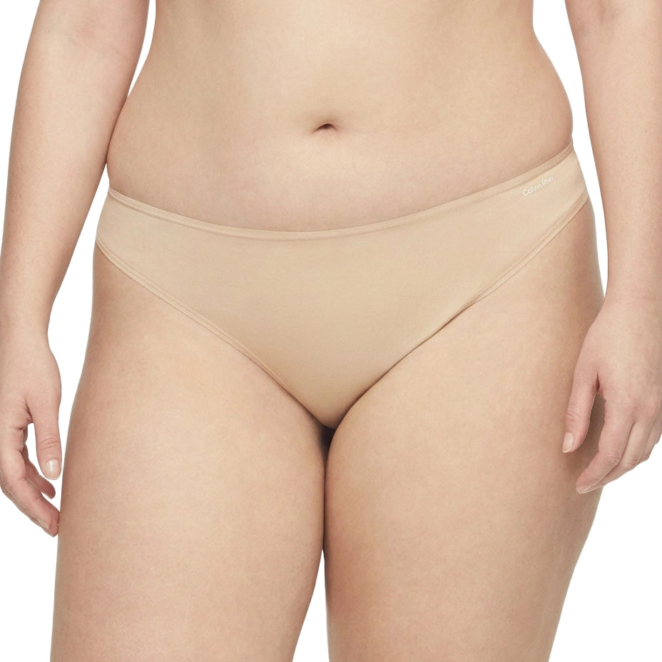 Beige underwear on a white background