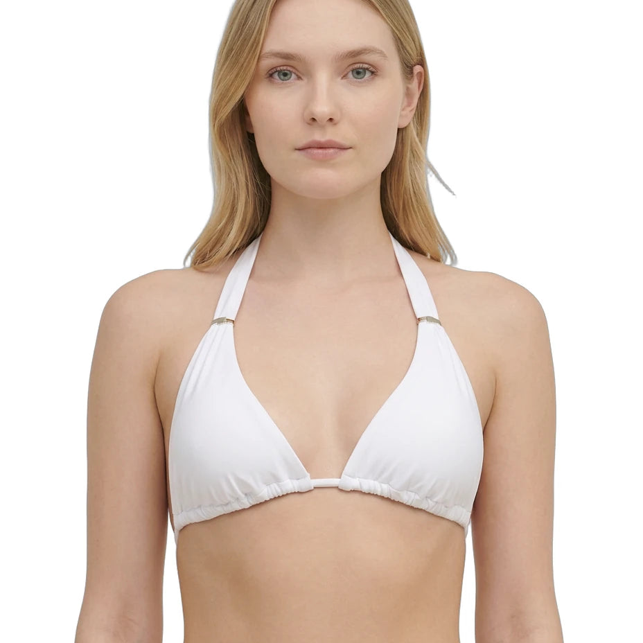 Woman wearing a white bikini Calvin Klein top on a white background