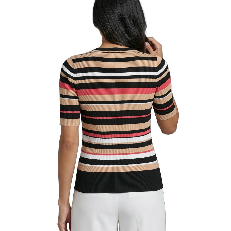 Woman wearing a Calvin Klein striped sweater with a white background