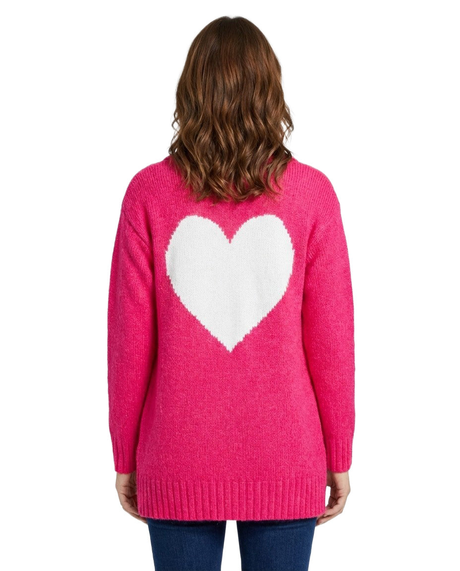Person wearing a pink sweater with a white heart design on the back against a white background