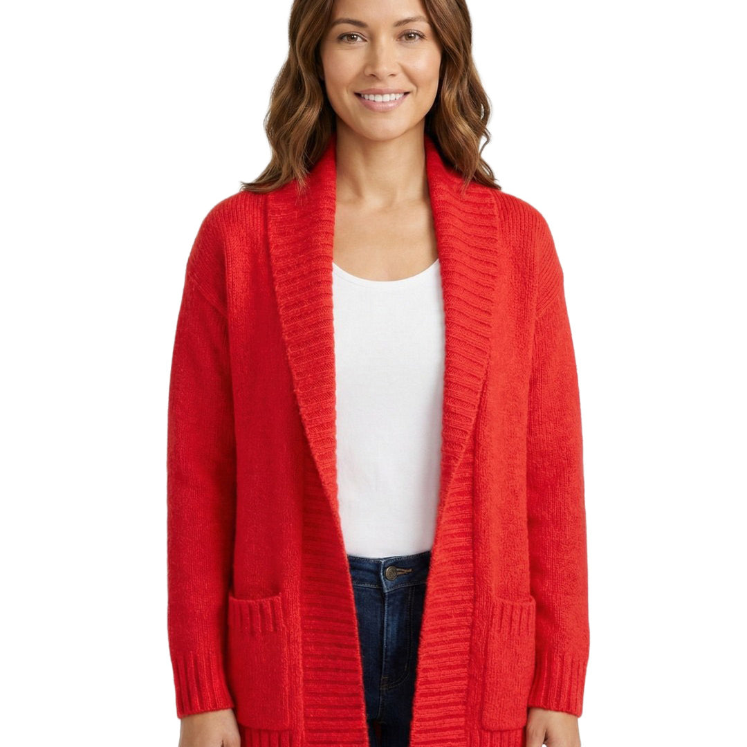 Woman wearing a red cardigan over a white shirt on a white background