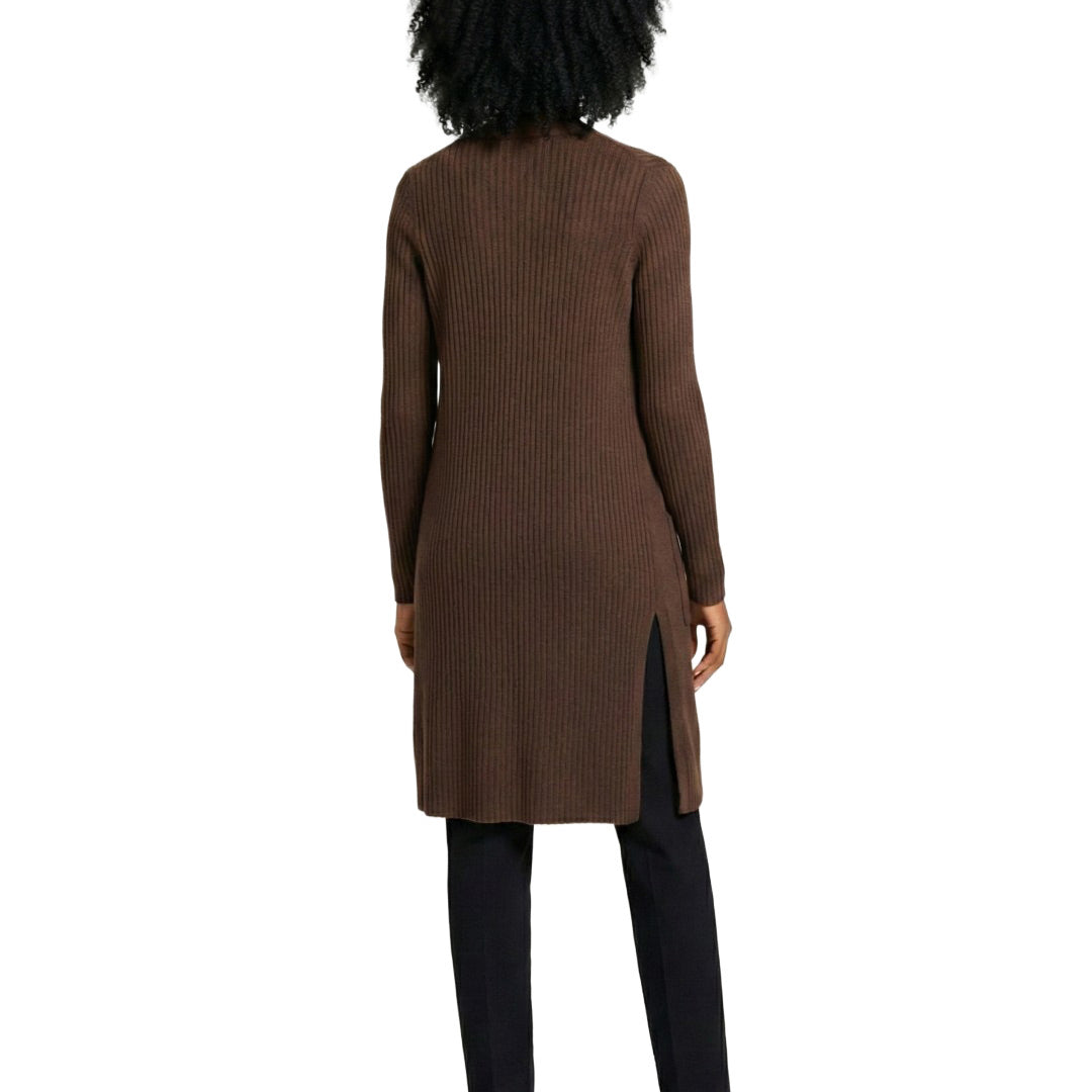 Person wearing a brown ribbed long cardigan on a white background