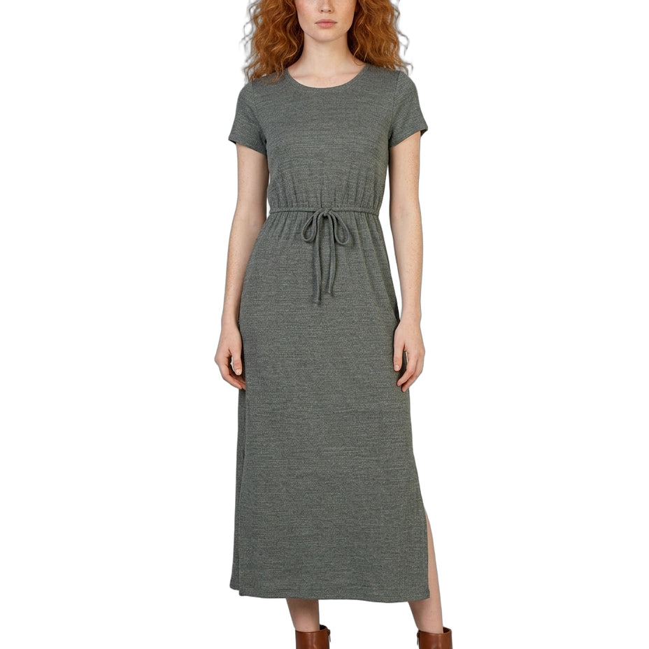 Woman wearing a gray dress with a white background