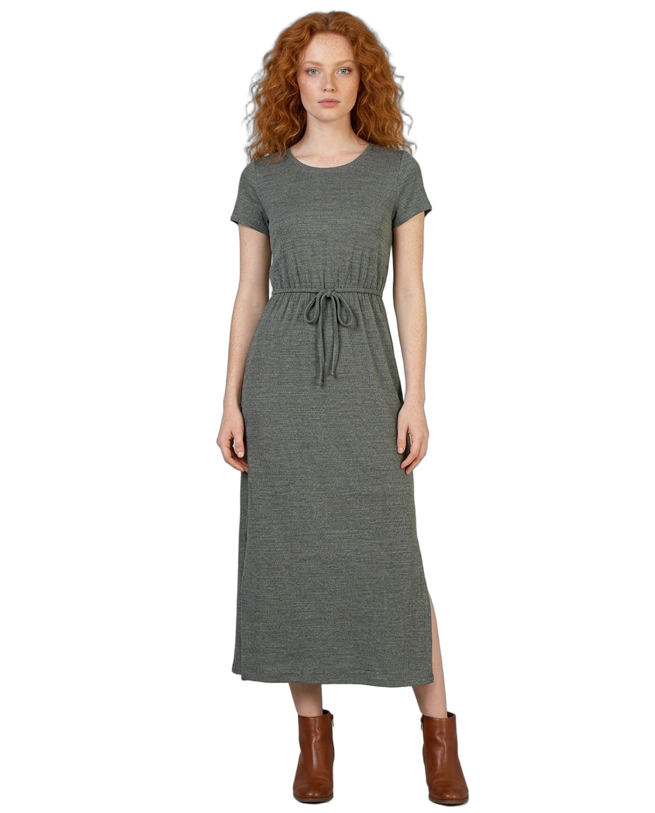 Woman wearing a gray dress with a white background
