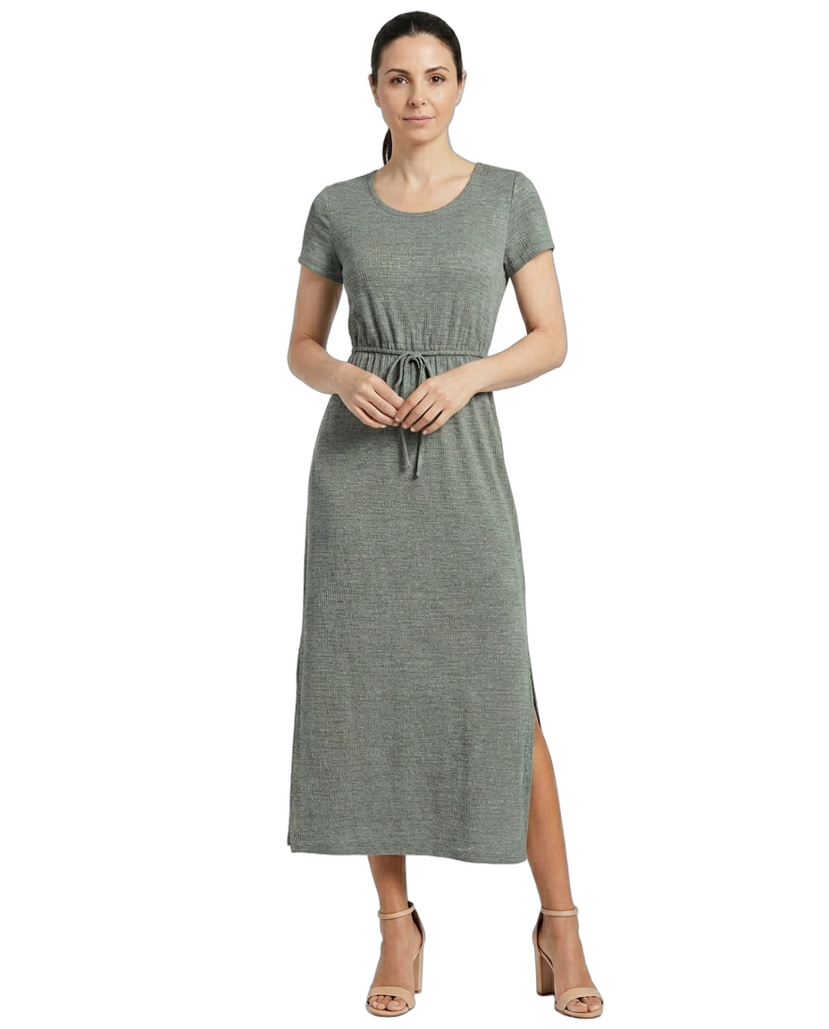 Woman wearing a gray dress with a white background