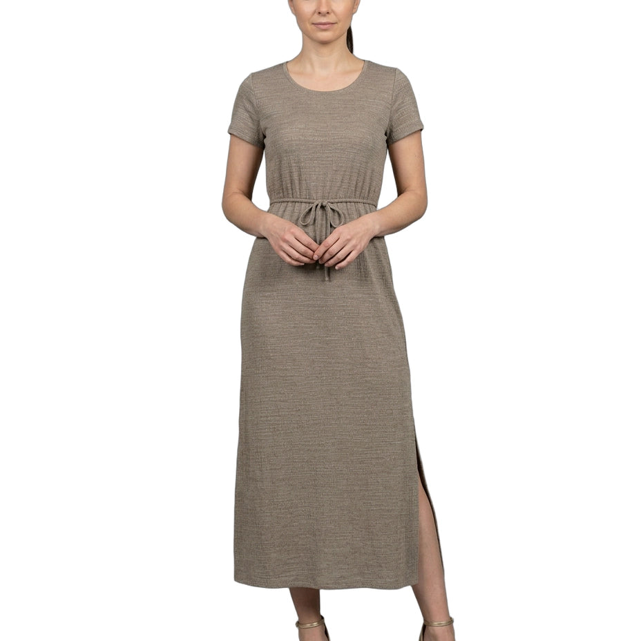 Woman wearing a brown dress with a white background