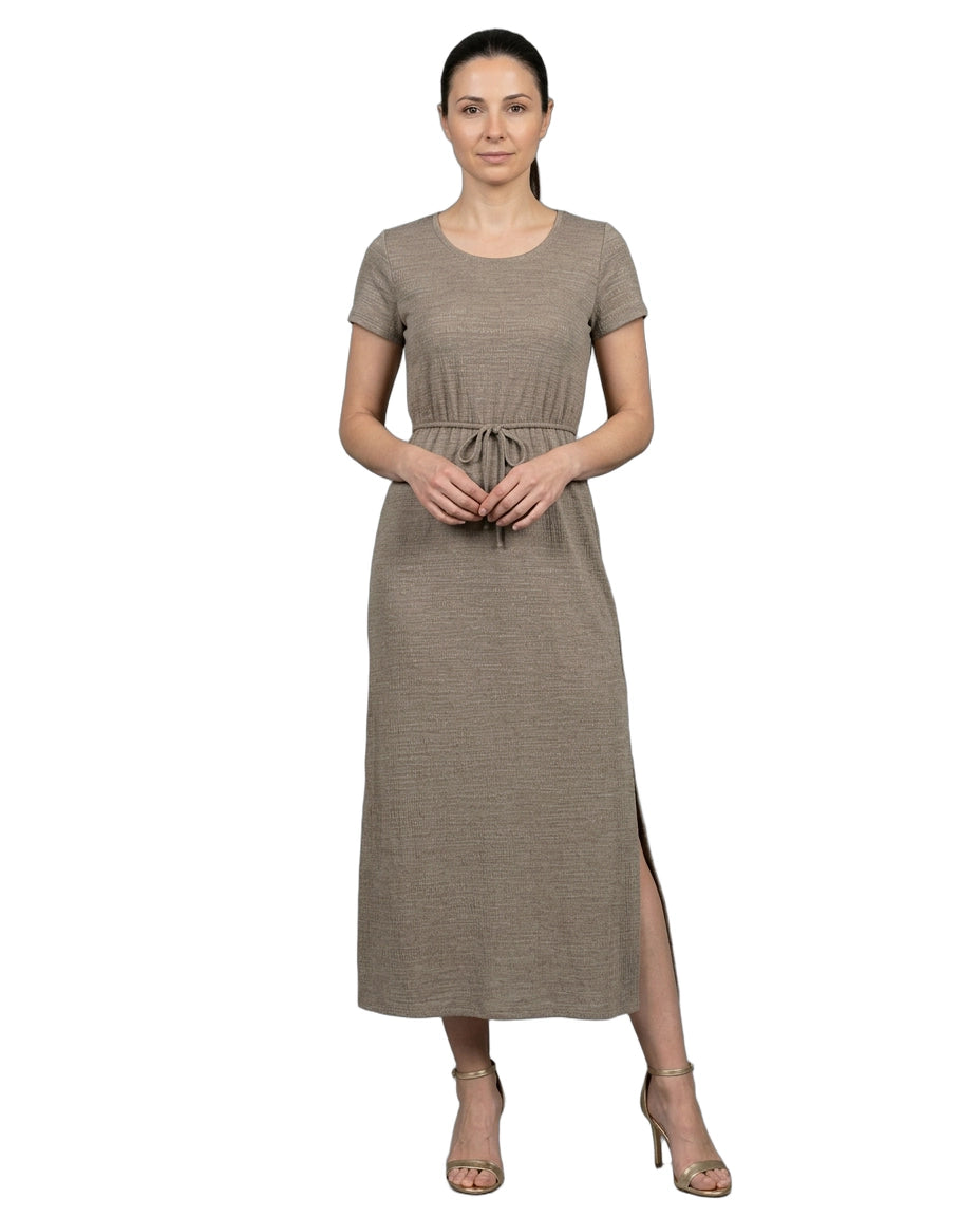 Woman wearing a brown dress with a white background