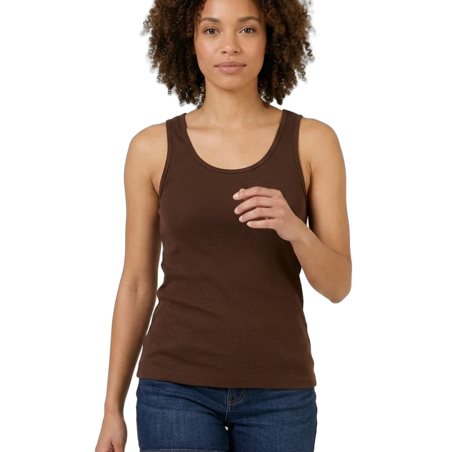 Woman wearing a brown tank top and blue shorts on a white background
