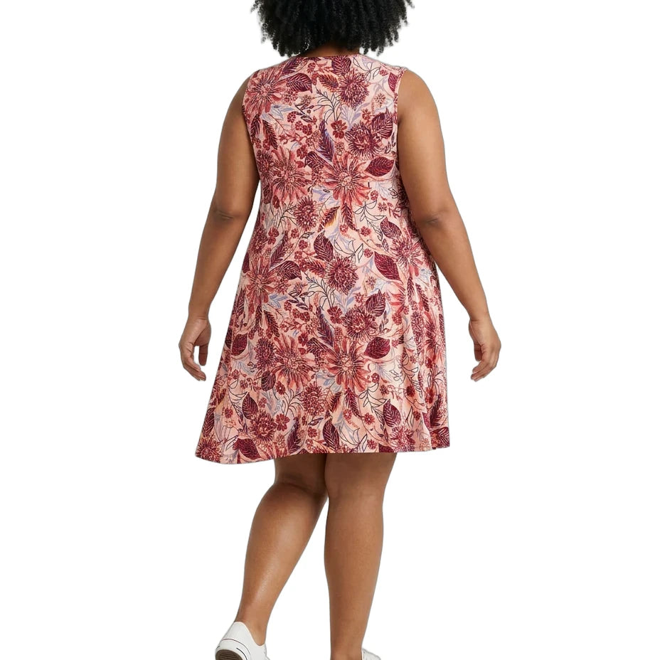Woman wearing a floral dress on a white background