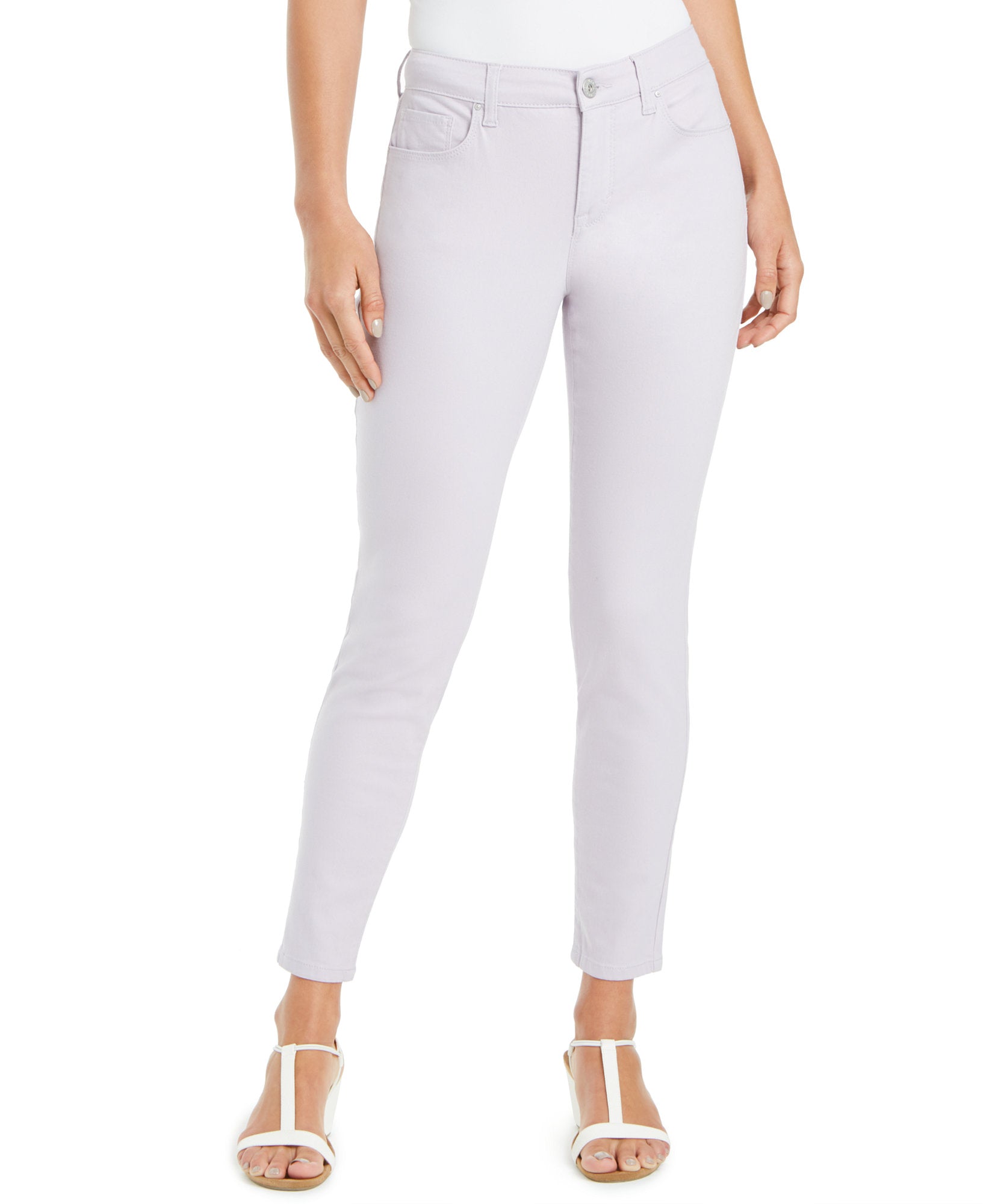 Light purple jeans worn by a person on a white background