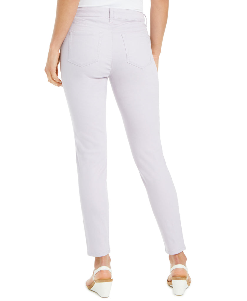 Light purple pants worn by a person on a white background