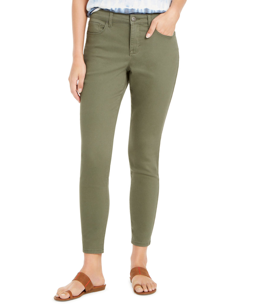 Person wearing olive green pants on a white background