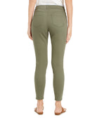 Person wearing olive green pants on a white background