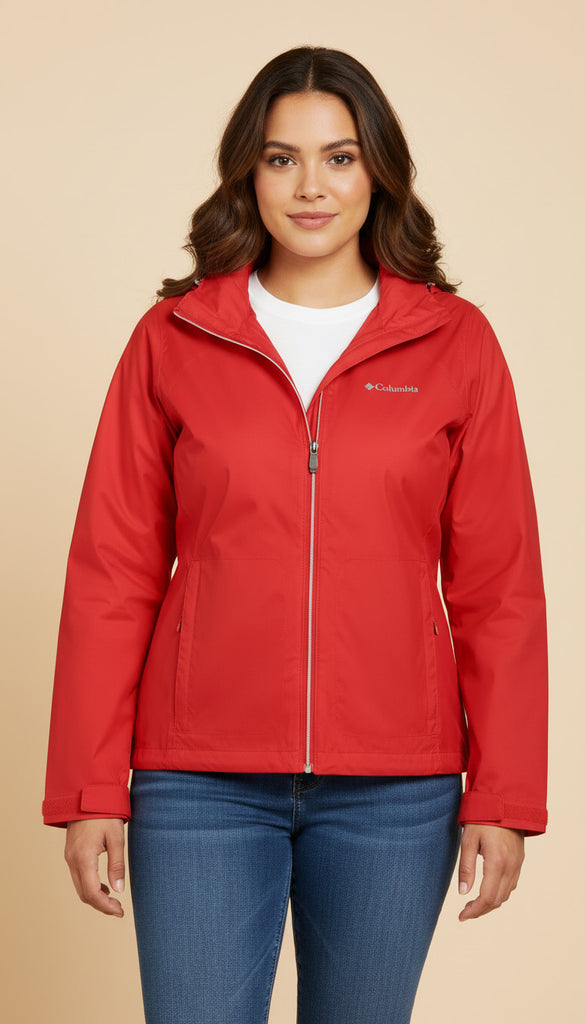 Woman wearing a red jacket with Columbia logo on a beige background