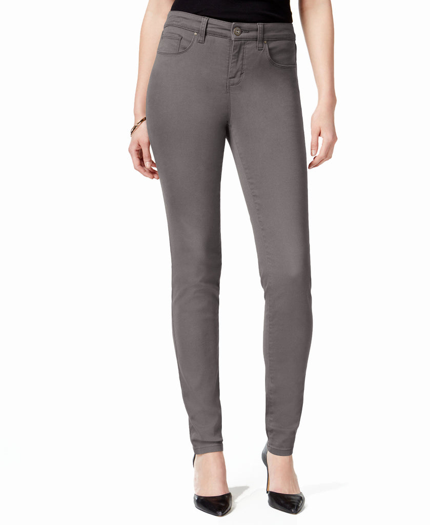 Gray pants worn by a person on a white background