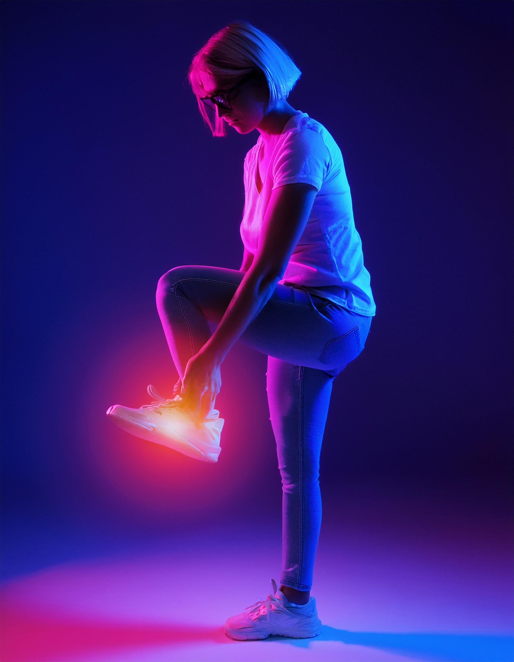Women standing suffering foot pain