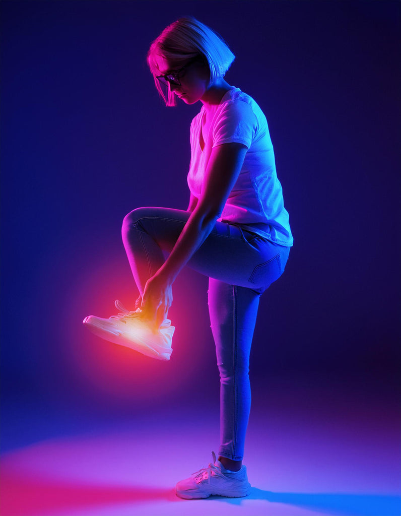 Women standing suffering foot pain