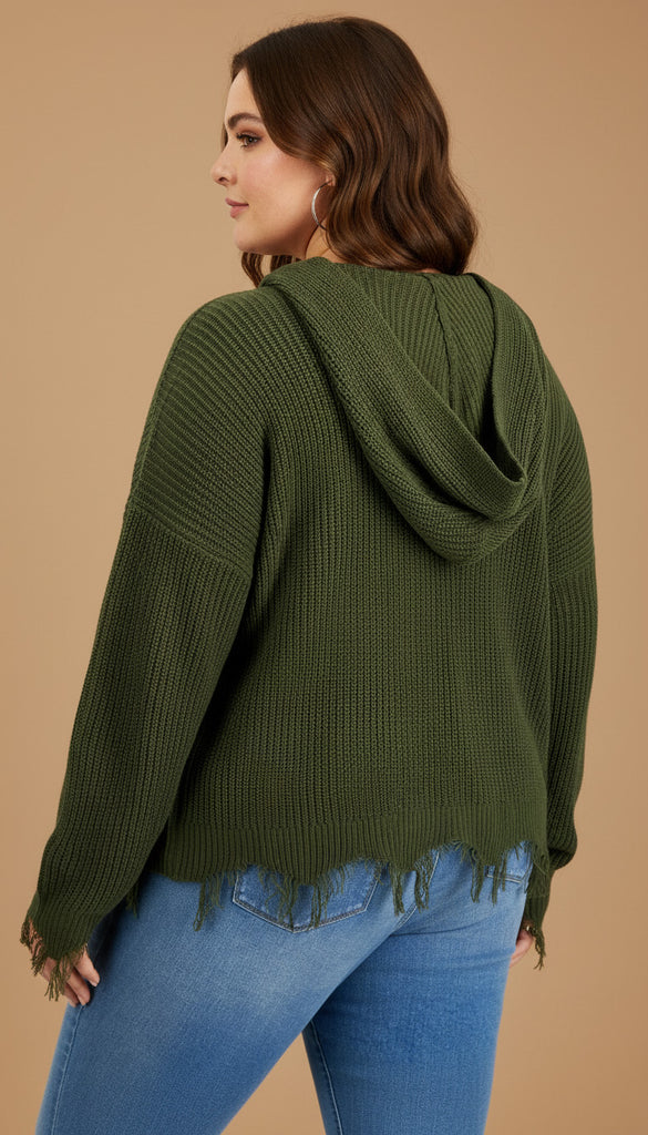 Woman wearing a green hoodie and blue jeans on a beige background