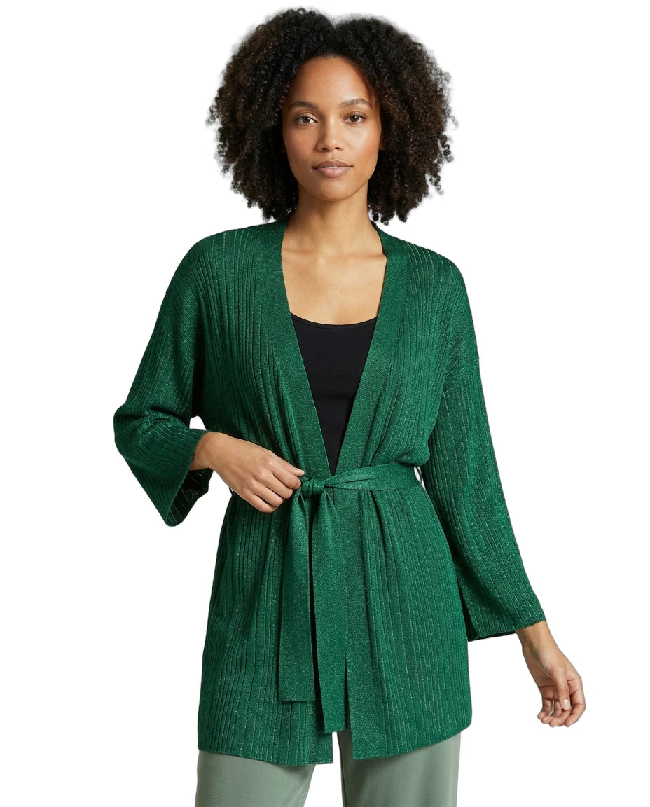 Woman wearing a green cardigan on a white background