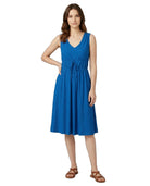 Woman wearing a blue dress on a white background