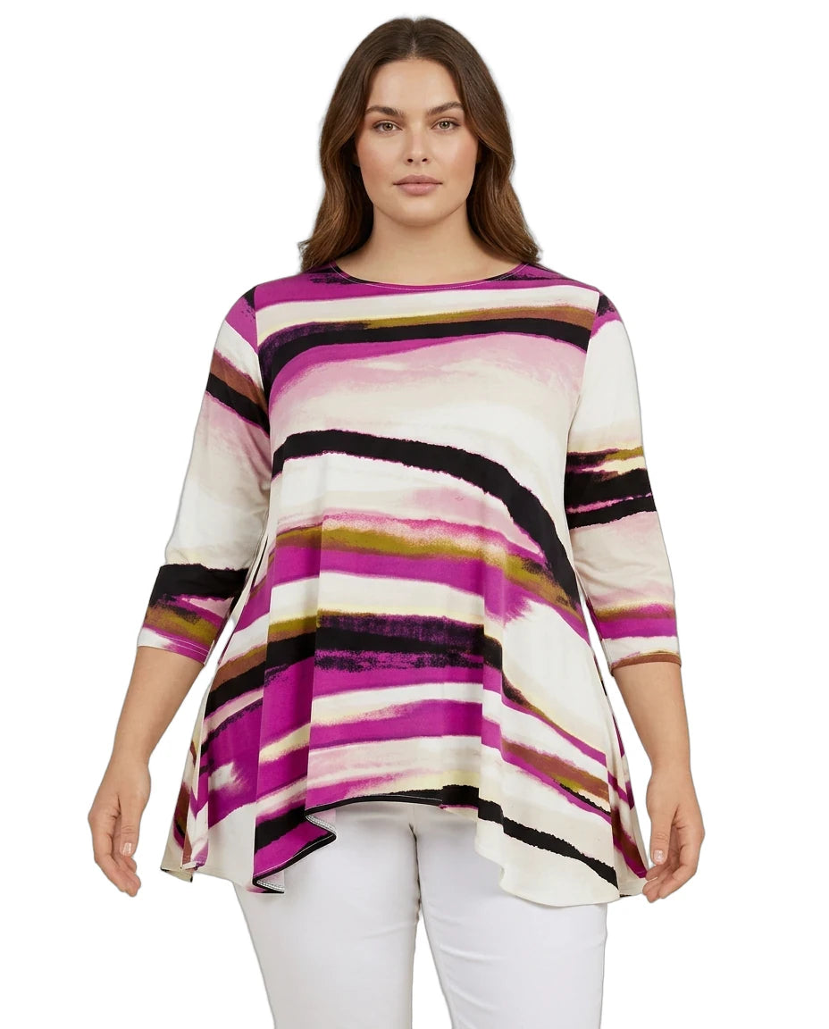 Woman wearing a colorful striped sweater on a white background