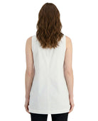 Woman wearing a white sleeveless top on a white background