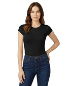 Woman wearing a black t-shirt and blue jeans on a white background