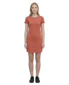 Woman wearing a rust-colored Calvin Klein t-shirt dress on a white background
