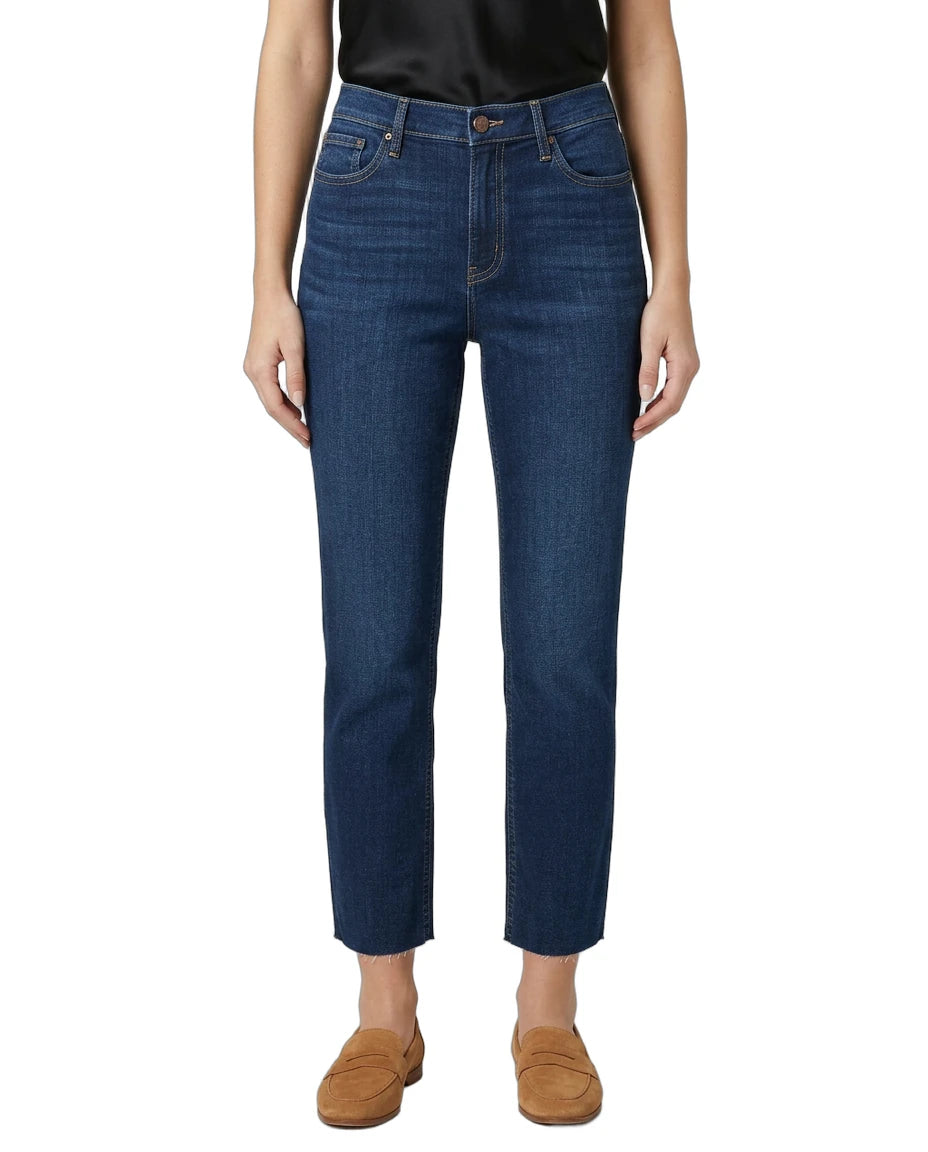 Person wearing blue jeans on a white background
