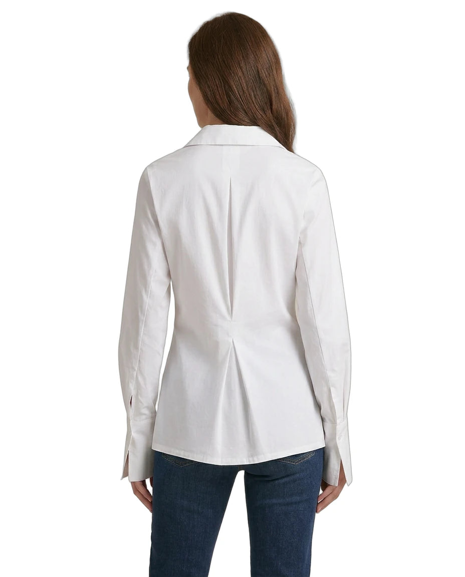 Woman wearing a Calvin Klein white blazer on a white background