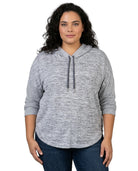 Woman wearing a gray hoodie on a white background